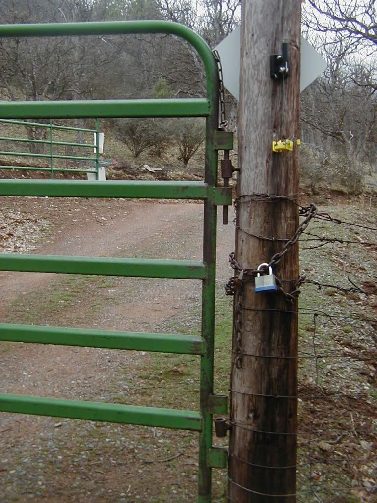 Permanent chain and locks on gate POST Pictures, Images and Photos