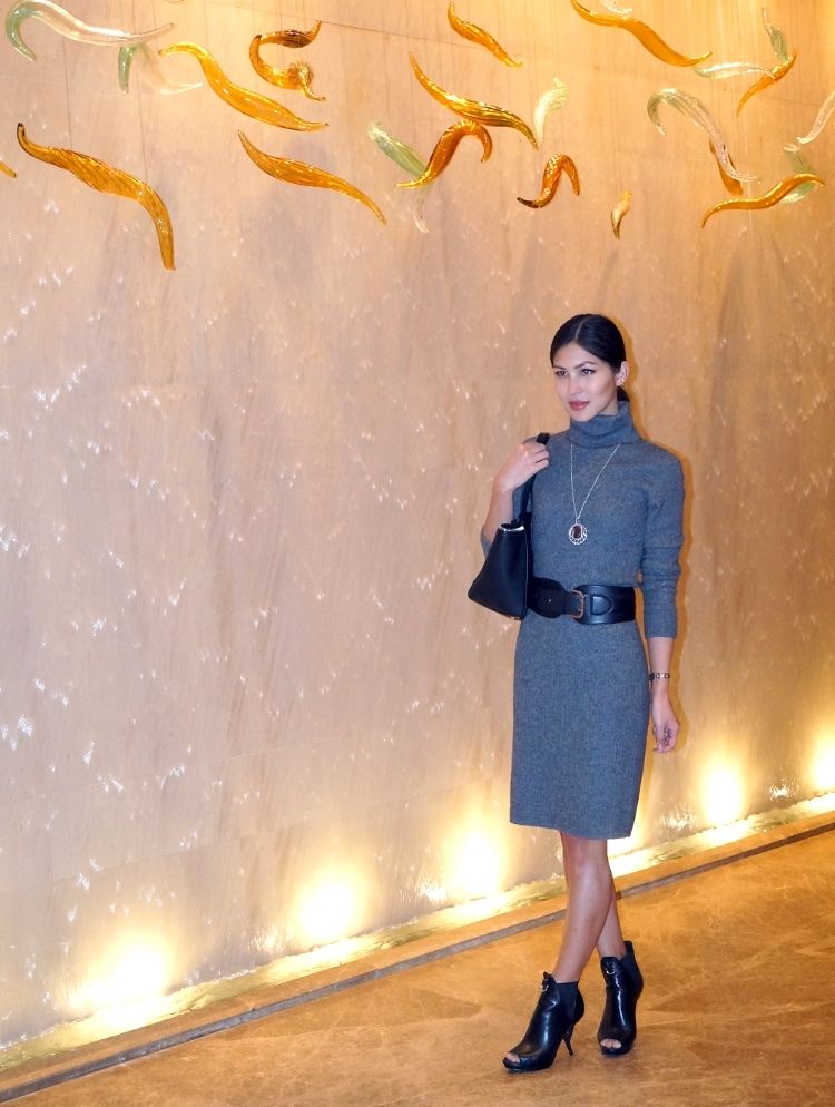 Euriental | fashion & luxury travel | wearing cashmere jumper dress with waist-cinching belt, Salvatore Ferragamo bag and ankle boots at Shangri-La, Shanghai.