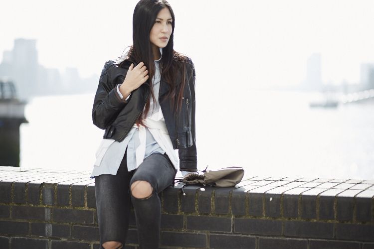 Euriental | fashion & luxury travel | wearing layers with H&M shirt, Versace white waistcoat, leather jacket, H&M ripped jeans and Zara booties.