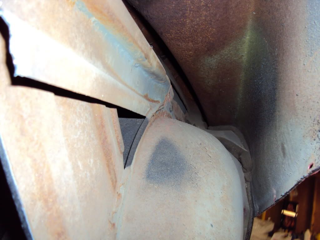 Rust on inside of quarter panel. How to remove?